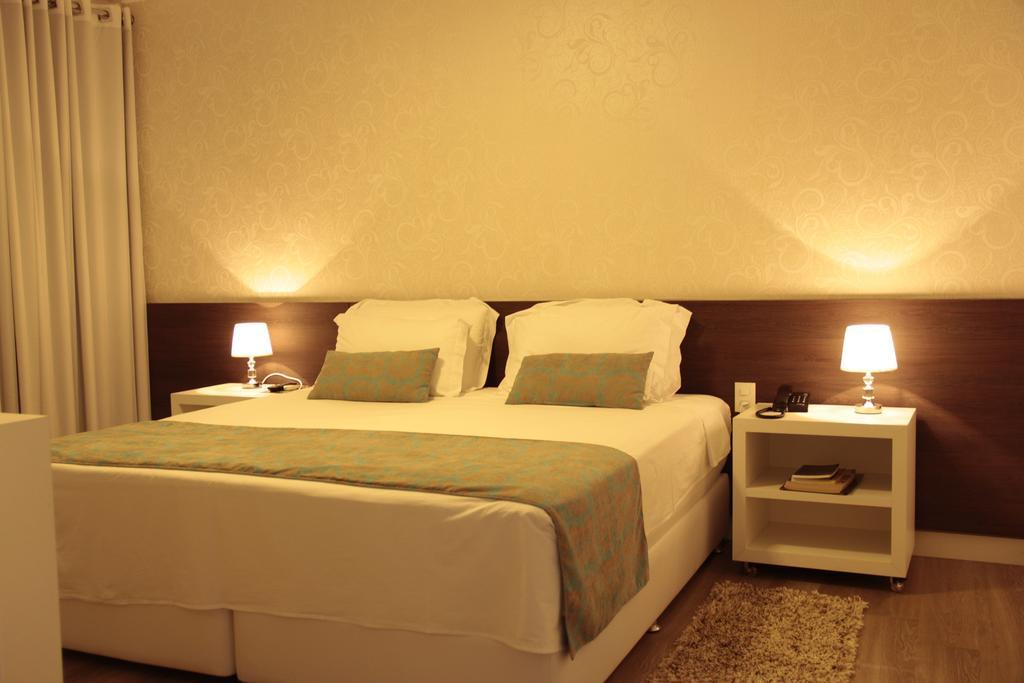 Hz Hotel Патус-ди-Минас Экстерьер фото